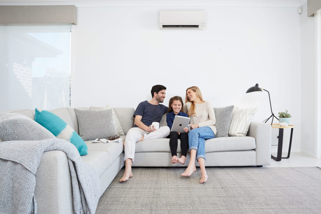 family under heating and cooling system